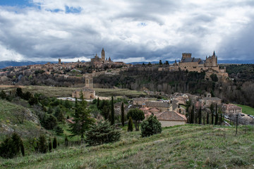 Fototapeta na wymiar View over the town with its cathedral and medieval walls in Segovia