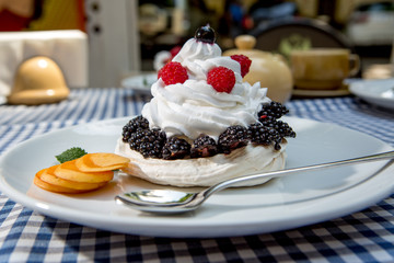 whipped cream with berries and strawberries