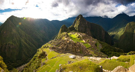 Panoramic view of sunset over Machu Picchu, Peru - obrazy, fototapety, plakaty