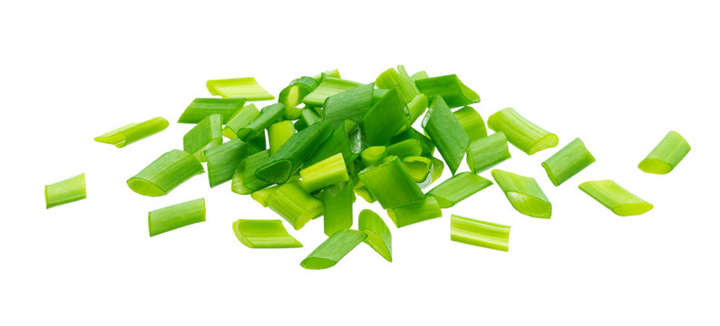 Chopped chives, fresh green onions isolated on white background