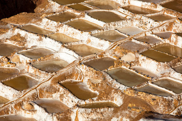 Historical salt mining pans of Maras in Peru