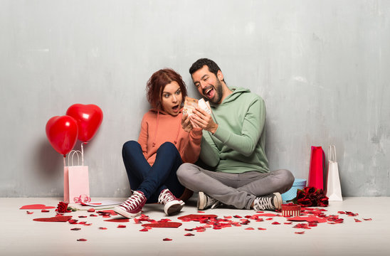 Couple in valentine day taking a lot of money - Powered by Adobe