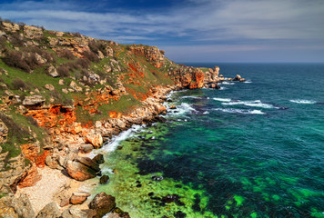 Beautiful landscape with blue sea and rocky shore