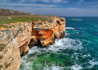 Obraz premium Beautiful landscape with blue sea and rocky shore