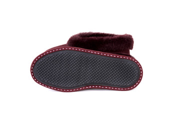 Red leather slippers isolated on white background