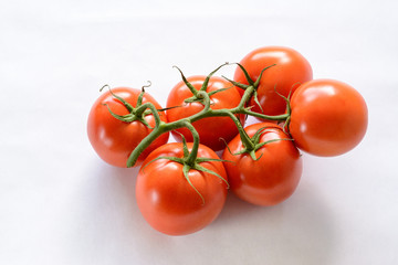 Tomatoes on a white background
