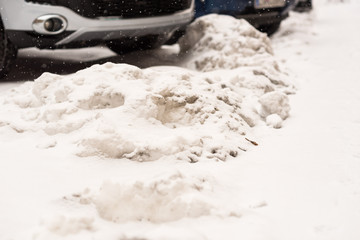 Car on winter road covered with snow. Vehicle at snowfall