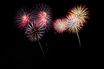 Fototapeta na wymiar Abstract colored firework background with free space for text.