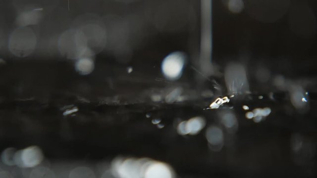 Abstract black and white water moving like volcano lava in slow motion   