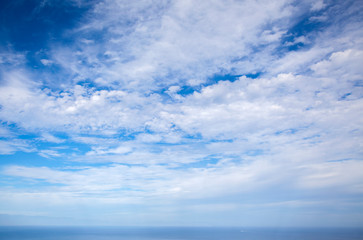 Naklejka na ściany i meble cloudscape over ocean