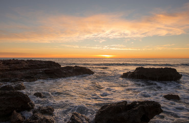 Fototapeta na wymiar Sunrise by the Mediterranean Sea in Oropesa, Castellon