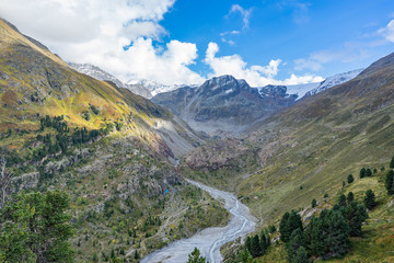 Mountains, peaks, lake, everlasting ice and trees landscape. Kaunertaler Gletscher natural environment. Hiking in the alps, Kaunertal, Tirol, Austria, Europe