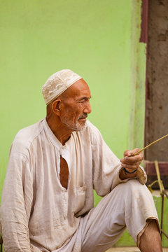 uyghur man in the street II, keriya