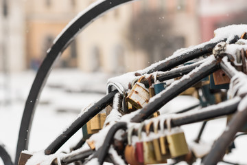 Love locks covered by snow during Valentine's day.