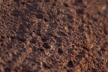 brown ripped stone background for text