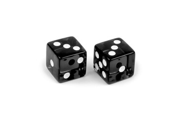 Two black glass dice isolated on white background. Three and three.