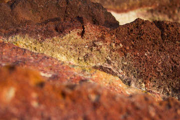 brown yellow red rock porous background for text