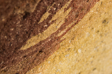 brown yellow stone background for text in focus