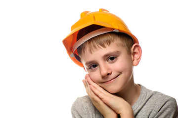 Boy in orange construction helmet. Portrait, face. Isolate on white background