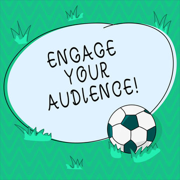 Word writing text Engage Your Audience. Business concept for get them interested, give them a reason to listen Soccer Ball on the Grass and Blank Outlined Round Color Shape photo