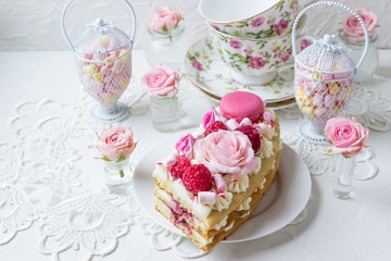 A piece of cake with flowers. Romantic Valentine's Day breakfast.