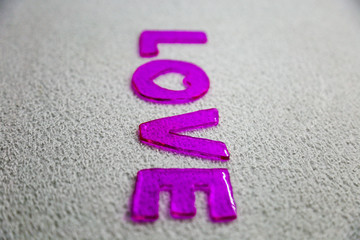 Love message written on the gray background