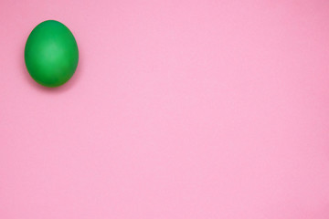 Easter egg on colored background