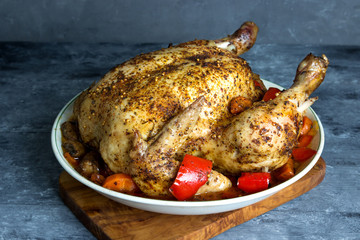Baked chicken with vegetables and herbs.