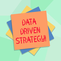 Conceptual hand writing showing Data Driven Strategy. Business photo showcasing decisions based on data analysis and interpretation Multiple Layer of Sheets Color Paper Cardboard with Shadow