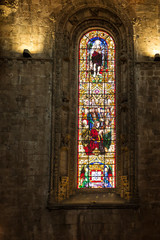Lisbon, Portugal, June 16, 2018: Colorful stained glass. Detail of the inside of the Jeronimos...