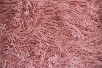 background texture. llama fur. artificial fur. pink fur