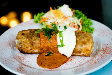 Oven Baked Chicken Chimichanga, With red beans, rice, cheese and tomato topped with sour cream