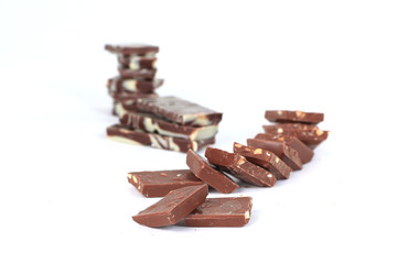 slices of original milk chocolate .isolated on white