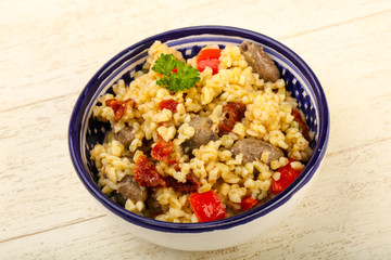 Bulgur with chicken hearts