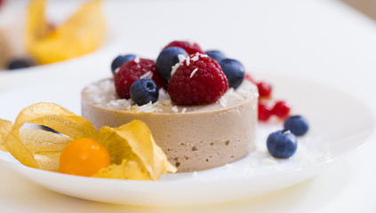 Food. Souffle, raspberries, blueberries, physalis