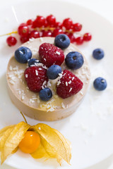 Food. Souffle, raspberries, blueberries, physalis