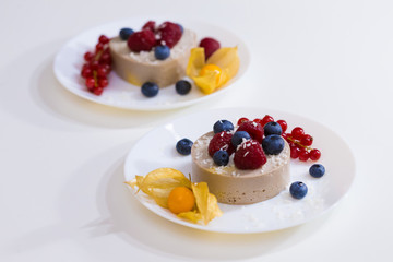 Food. Souffle, raspberries, blueberries, physalis