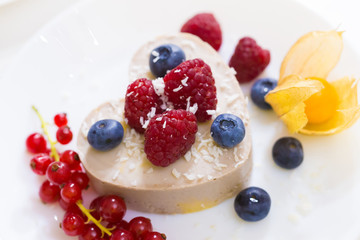 Food. Souffle, raspberries, blueberries, physalis