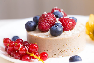 Food. Souffle, raspberries, blueberries, physalis