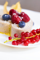 Food. Souffle, raspberries, blueberries, physalis