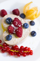 Food. Souffle, raspberries, blueberries, physalis