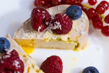 Food. Souffle, raspberries, blueberries, physalis