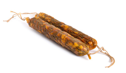 Homemade drying sausage. Isolated on white background.