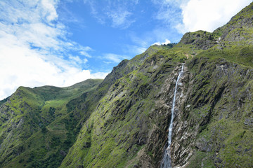 View of the waterfall on the way to Amjilosa village. Kangchenjunga, Great Himalaya Trail in Nepal.