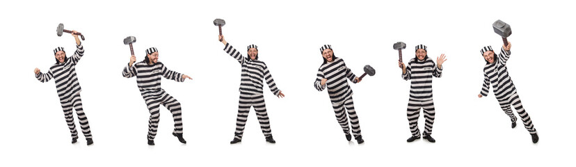 Prison inmate with hammer isolated on white