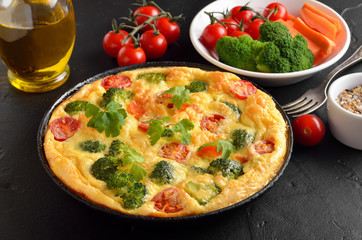 Frittata with broccoli and  tomatoes