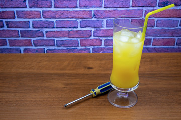 Screwdriver cocktail (vodka and orange juice) in highball glass
