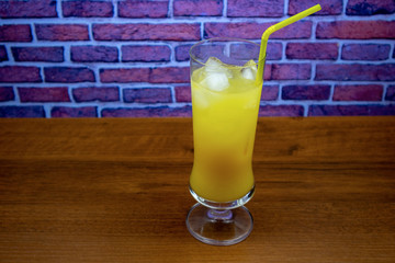 Screwdriver cocktail (vodka and orange juice) in highball glass