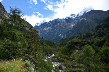 Fototapeta na wymiar Beautiful of the valley, river and Himalayan Mountains on the way to Ghunsa. Trek to Kangchenjunga basecamp, Nepal