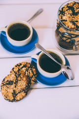 hot coffee, chocolate and cookies in morning